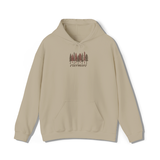 taylors swifts evermore album title embroidered onto a sand coloured hoodie