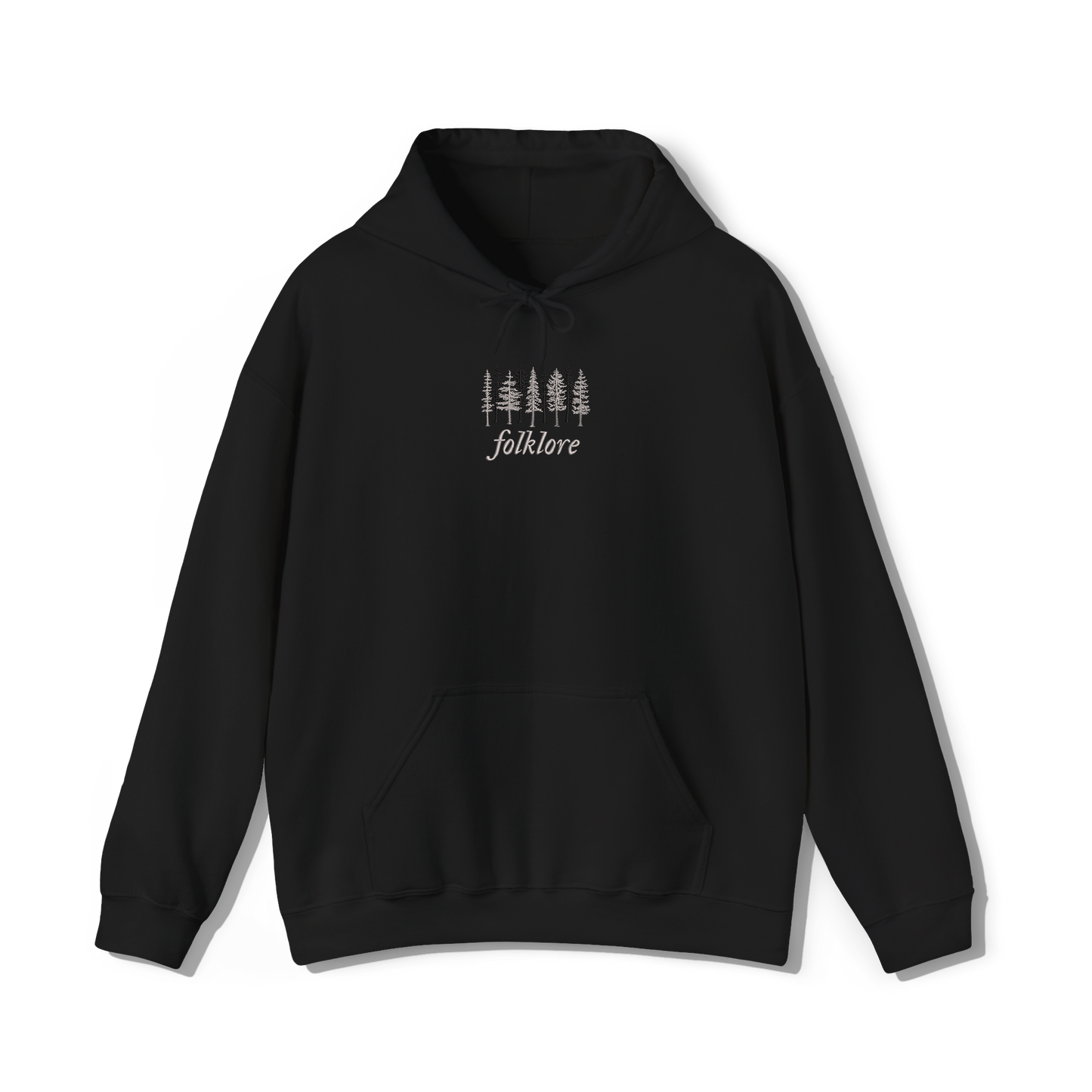 taylor swifts folklore album title embroidered alongside some trees on a black coloured hoodie