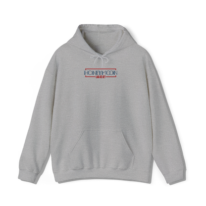 light grey coloured hooded sweatshirt that has lana del reys album,  honeymoon embroidered on the centre chest in the same font and colour as it appears on the album  cover alongside an rectangle outline to give an old hollywood bilboard aesthetic to the design