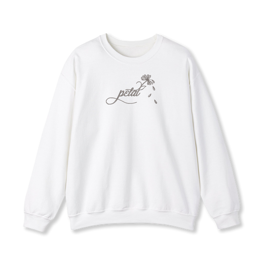 White sweatshirt with dark grey embroidered “petal” calligraphy design extending into a daisy stem